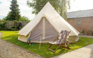 Bell tent in a back garden for bell tent hire in Essex