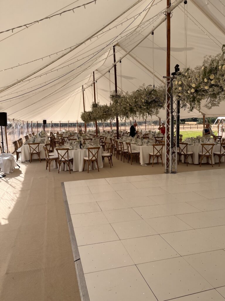 Outdoor Christmas celebration created with party furniture hire and cosy décor touches