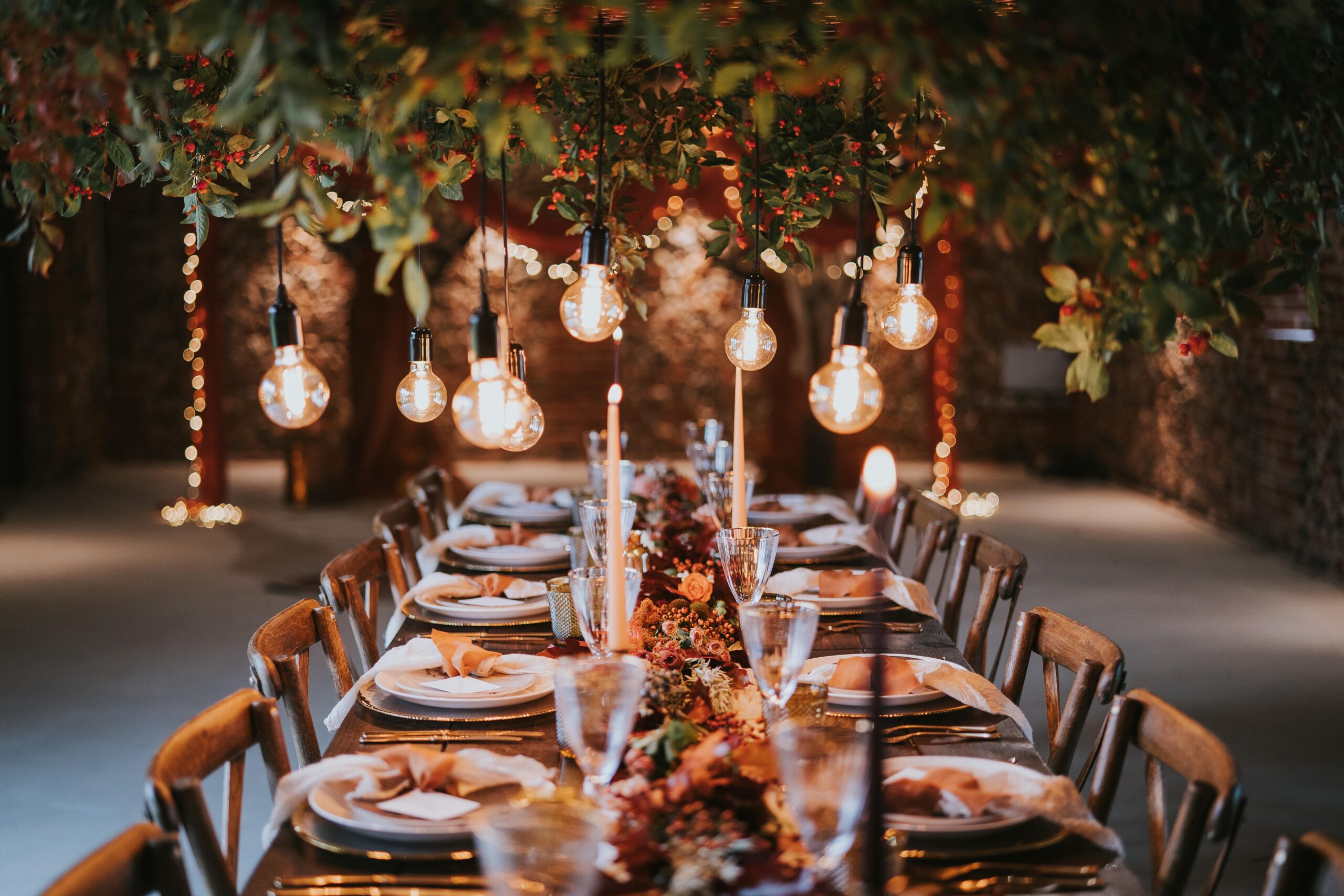 Stylish winter marquee with party furniture hire, fire pits and warm festive lighting.