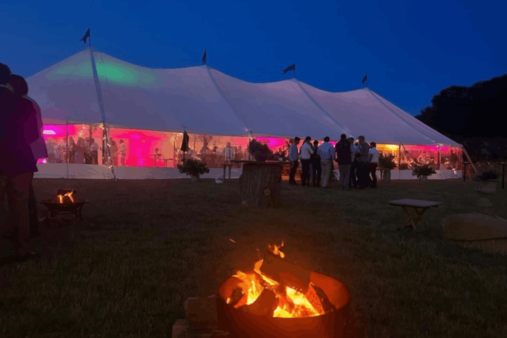 Cosy winter party styling featuring a heated marquee, festoon lighting and relaxed seating for a January celebration.